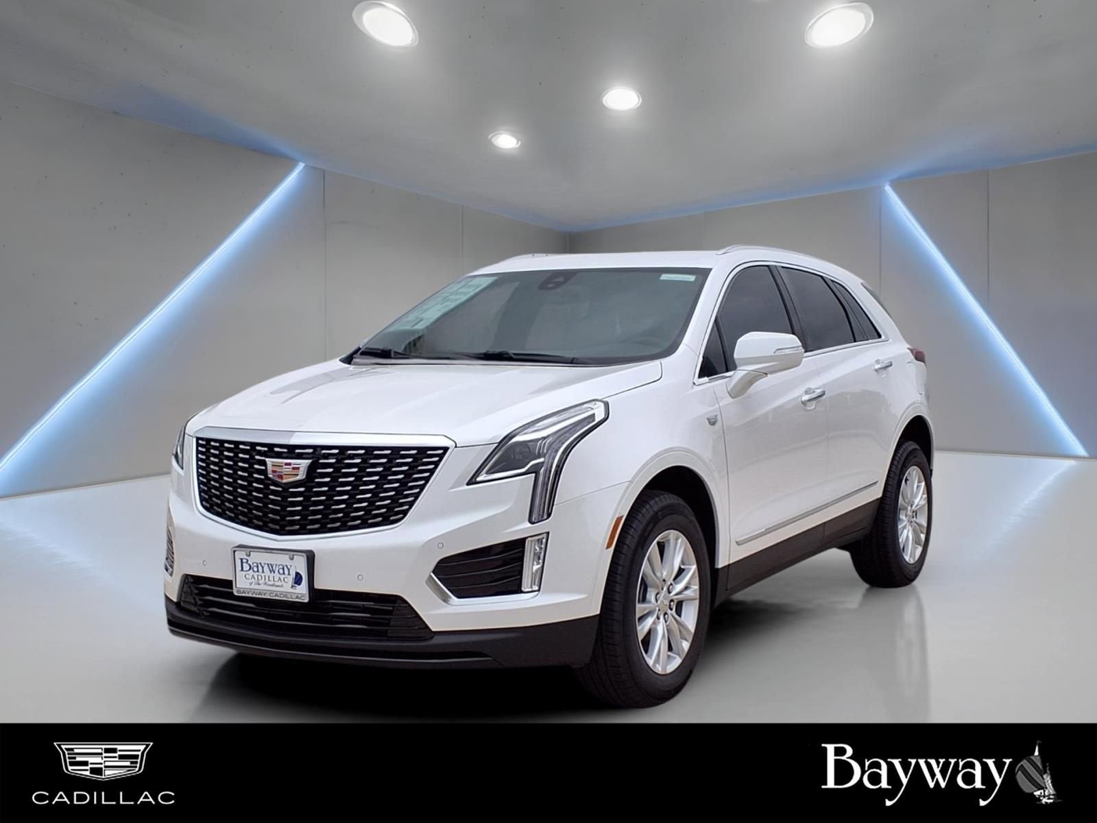 2026 Cadillac XT5 Luxury in Crystal White Tricoat — front three-quarter view