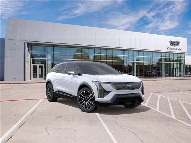 2026 Cadillac OPTIQ Sport in Vibrant White Tricoat — front three-quarter view