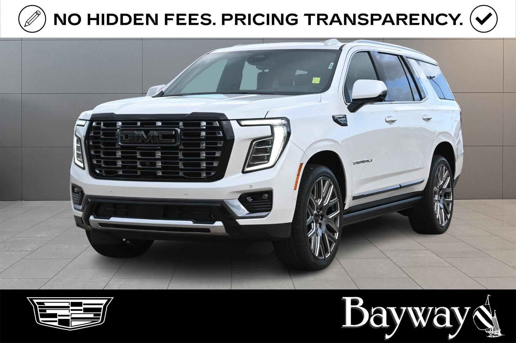 2025 GMC Yukon Denali Ultimate in White Frost Tricoat — front three-quarter view