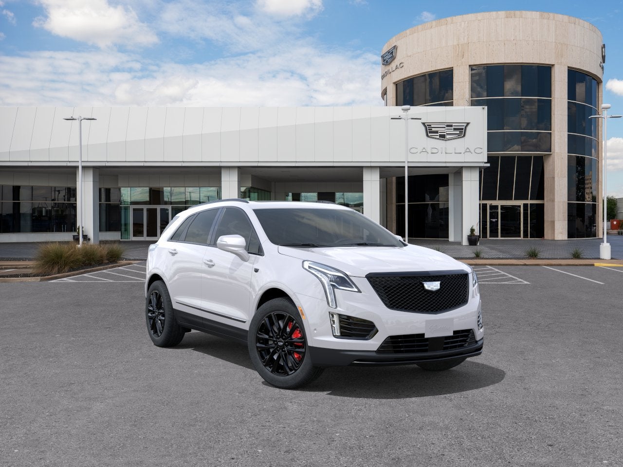 2026 Cadillac XT5 Sport in Crystal White Tricoat — front three-quarter view