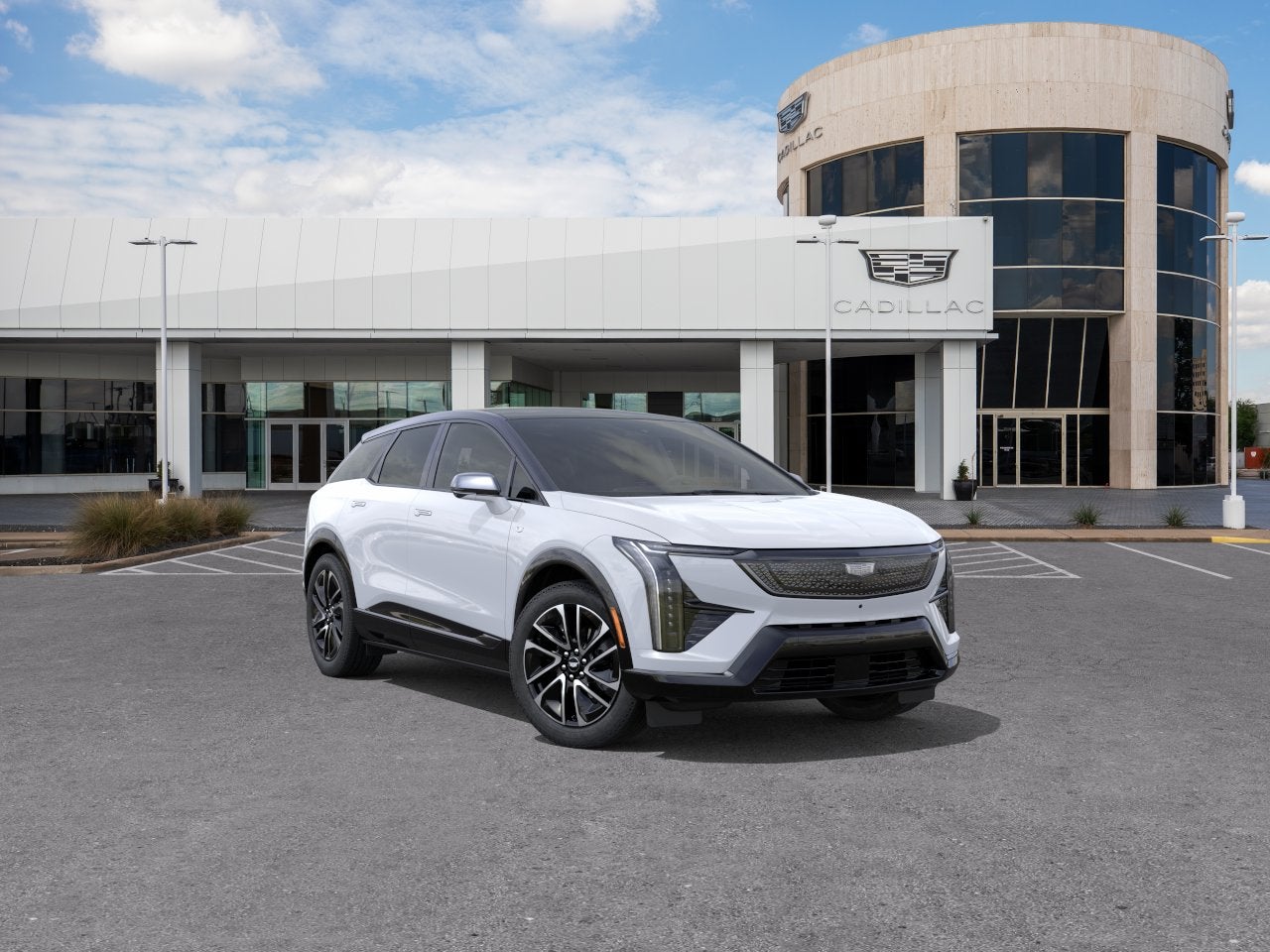 2026 Cadillac OPTIQ Sport in Vibrant White Tricoat — front three-quarter view
