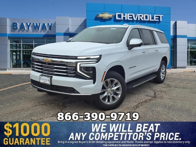 2026 Chevrolet Suburban Premier in Polar White Tricoat — front three-quarter view